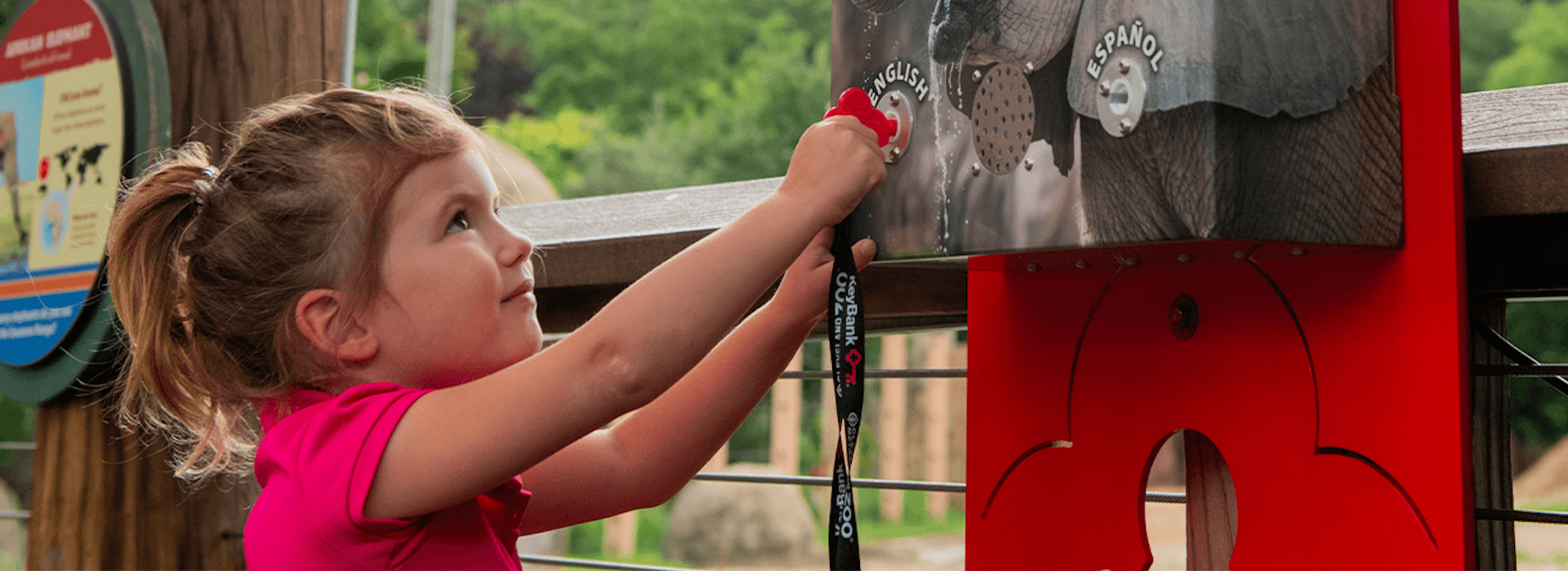 Girl placing her key on the machine