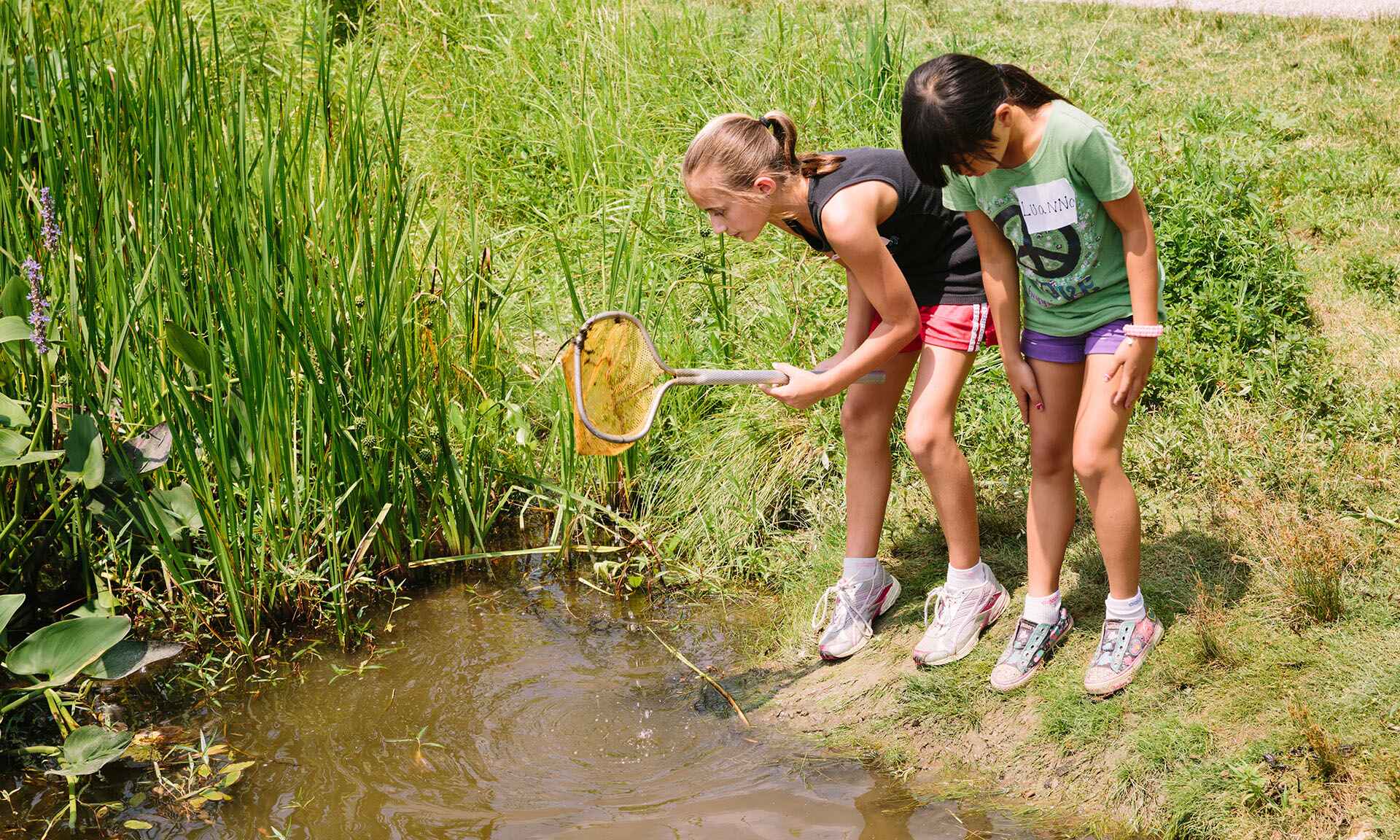 Kids by water