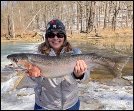 Woman holding a fish