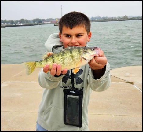 Boy holding a fish