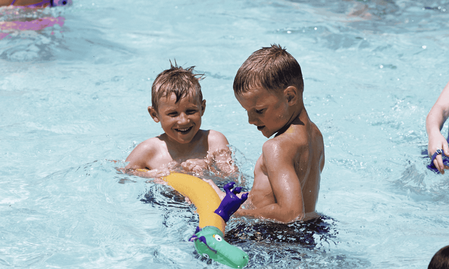 Kids swimming in pool